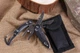 Mультитул Traveler Black 7 в 1 с карабином мультифункциональный инструмент в чехле - изображение 2