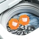 Многоразовые мячики для стирки одежды Orange Panda набор шариков - ловушек для собирания ворса / шерсти / ниток / волос во время машинной стирки одежды, 2 шт, оранжевый (104450826) - изображение 5