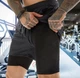 Спортивные мужские шорты базовые 2 в 1 двойные с тайтсами для бега и спортзала (Черный) XL - изображение 2