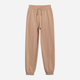 Spodnie dresowe dziewczęce joggery 4F 4FJWSS25TTROF1187-83S 134 cm Beżowe (5905700426141) - obraz 6