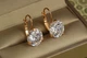 Серьги Xuping Jewelry акапелла с камнем 2,1 см золотистие - изображение 1
