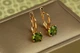 Сережки Xuping Jewelry солістка з смарагдовим каменем 1,7 см золотисті - зображення 1