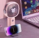 Портативный мини аккумуляторный вентилятор ручной Handheld Fan KLW-F8 с подставкой для телефона 5 Вт Розовый - изображение 4