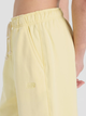 Спортивні штани жіночі New Balance Nb Athletics WP41513 L Жовті (197967309977) - зображення 8