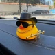 Игрушка-декор в салон авто Xiamen резиновая уточка в шляпе с автоматом Желтая (PH051426) - изображение 4