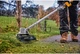 Коса акумуляторна безщіткова DeWALT, 18 В, 5 Аг, жилка 2 мм, ширина косіння 36 см, 1 акумулятор і зарядний пристрій (DCMST561P1) - изображение 5