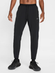 Spodnie dresowe męskie Nike M Nk Df Stride Wvn Pant HV4544-010 M Czarne (197860503618) - obraz 1