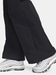 Spodnie dresowe damskie szerokie Nike W Nsw Trend Wvn Mr Pant FQ3588-010 L Czarne (196974881766) - obraz 4