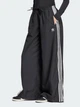 Брюки женские Adidas Originals Adicolor Firebird Oversized JD3390 XL Черные (4067902894393) - изображение 1