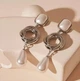 Сережки ефектні підвіски з великими намистинами jewelry Сріблястий - білий - зображення 3
