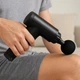 Массажер для тела и мышц аккумуляторный Fascial Gun, беспроводной массажный пистолет с 4 насадками и 6 скоростями, портативный электрический вибромассажер для глубокого массажа спины, шеи, ног, рук Черный, KH-320-Black - изображение 1