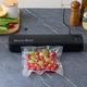Вакуумный упаковщик с функцией запайки Vacuum Sealer с LCD-дисплеем мощность до -80 кПа набор пакетов черный - изображение 7