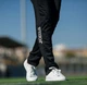 Штани спортивні жіночі Joma CHAMPION IV чорні 2XL 900450.100 - зображення 2