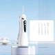 Портативный ирригатор для ротовой полости A6s с 4 сменными насадками USB зарядка аккумуляторный - изображение 3
