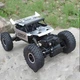 Радиоуправляемая модель багги Rock Buggy 4x4 — скоростной внедорожник с полным приводом для бездорожья, масштаб 1:18, RTR комплект - изображение 1