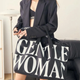 Дорожня сумка листоноша Джентльвумен/Gentlewoman через плече полотняна підліткова універсальна чорна 32см*27см*58см (II) 33722 - зображення 1