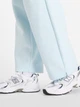 Спортивные штаны женские теплые New Balance Reimagined WP53505FRL S Светло-голубые (198686087252) - изображение 6