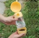 Пляшка - поїлка дорожня для собак і кішок 2в1 для води та корму Помаранчева - зображення 2