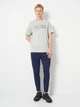 Футболка хлопковая длинная мужская Puma Essentials Graphics 68818404 M Light Gray Heather с принтом (4069157688819) - изображение 3