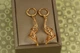 Серьги подвески Xuping Jewelry завитки 4,5 см золотистые - изображение 2