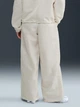 Спортивные штаны женские Nike W Nsw Nk Liq Shine Pant HV2475-133 L Бежевые (0198485084469) - изображение 2