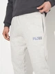 Спортивные штаны мужские утепленные Puma Essentials Graphics 68818704 XL Light Gray Heather (4069156536098) - изображение 4