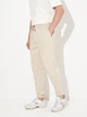 Спортивные штаны на флисе мужские Under Armour UA Icon Fleece Jogger 1373882-203 XL Бежевые (196885396403) - изображение 1