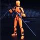 Фигурка-конструктор Робот Lucky 13 Dummy Lucky Puppets многошарнирный подвижный робот с сменной формой и аксессуарами (меч, топор, оружие), 14см (цвет - оранжевый) - изображение 5