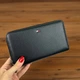 Чоловічий шкіряний клатч стиль Tommy Hilfiger, портмоне з натуральної шкіри чорний Томмі в коробці, на блискавці TT - зображення 6