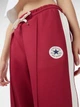 Спортивные штаны женские Converse CVW5B617-M1Z S Красные (0198820093286) - изображение 5