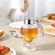 Дозатор для меда прозрачный 200 мл Honey Dispenser, компактный акриловый вместительный диспенсер-емкость для хранения и налива меда без капель с подставкой и нажимным рычагом, D-48 - изображение 6