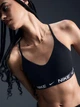 Top sportowy damski Nike W Nk Df Indy Lgt Spt Bra FD1062-011 L Czarny (197595465953) - obraz 1