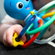 Гризак/брязкальце Baby Einstein Opus’s Shake & Soothe 0 міс + (13157) (74451131576) - зображення 1