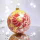 Новогодний шар на елку Santa Shop Петриковка Красная Птичка на золоте Золотой 10 см (4820001112276) - изображение 1