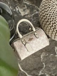 Сумка жіноча Mini Rowan Crossbody In Signature біло-пудрове барило - зображення 1
