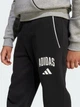 Детские теплые спортивные штаны на флисе для мальчика Adidas Essentials JM1538 128 см Black (4068808406345) - изображение 5