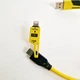 Кабель для швидкого заряджання телефону USB-A+Type-C на Type-C+Lightning 4 в 1 (65Вт), пружинний, жовтий, 1.5 м - зображення 4