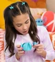 Фігурка-сюрприз у капсулі STITCH серії "Feed Me" - СТІЧ ЗІ СМАКОЛИКАМИ (в асорт., у диспл.) - изображение 5