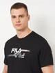 Футболка хлопковая длинная мужская Fila FAM1126-80010 S Черная с принтом (4067777248161) - изображение 4