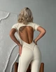 Спортивный женский комбинезон Zip Premium с акцентными силуэтными швами и коротким рукавом Открытая спина Без пуш-ап L Молочный (ZIP150MilkL) - изображение 2