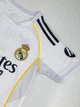Детская футбольная форма Real Madrid 2025/26 — Kylian Mbappé №10 (домашняя, белая), размер 26 (рост 140–145 см) - изображение 4