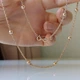 Серебрянное колье 925 пробы в позолоте 585 пробы с шариками - изображение 1