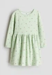 Дитяча бавовняна сукня для дівчинки H&M 122-128 см Світло-зелена (25120301D) - изображение 1