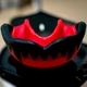 Капа для бокса боксерская для мма детская подростковая бокс GDragon Sport для боксеров карате тхэквондо кикбоксинга тайского бокса единоборств хоккея защитная для зубов спортивная Вампир с клыками силиконовая из термопластика Черно-красная 1_2_m_4 - изображение 9