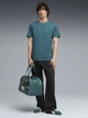 Футболка хлопковая длинная мужская Puma Essentials Tape 69169341 S Emerald Ice (4069161732089) - изображение 3