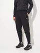 Спортивные штаны мужские утепленные Puma Essentials Elevated 68827701 2XL Black (4069157678155) - изображение 1