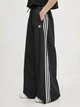 Брюки женские Adidas Originals Adicolor Firebird Oversized JD3390 XL Черные (4067902894393) - изображение 3