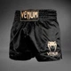 Шорты для тайского бокса и кикбоксинга Venum Classic (Muay Thai Shorts) черный/золотой р. S (Рост: 130–140 см | Вес: 30–35 кг) - изображение 1