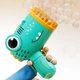 Пистолет для мыльных пузырей Dinosaur Bubble Gun с насадкой на 40 отверстий 50ml Green - изображение 3