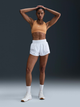 Спортивный топ женский Nike Swoosh DX6821-856 S Оранжевый (197860079045) - изображение 3